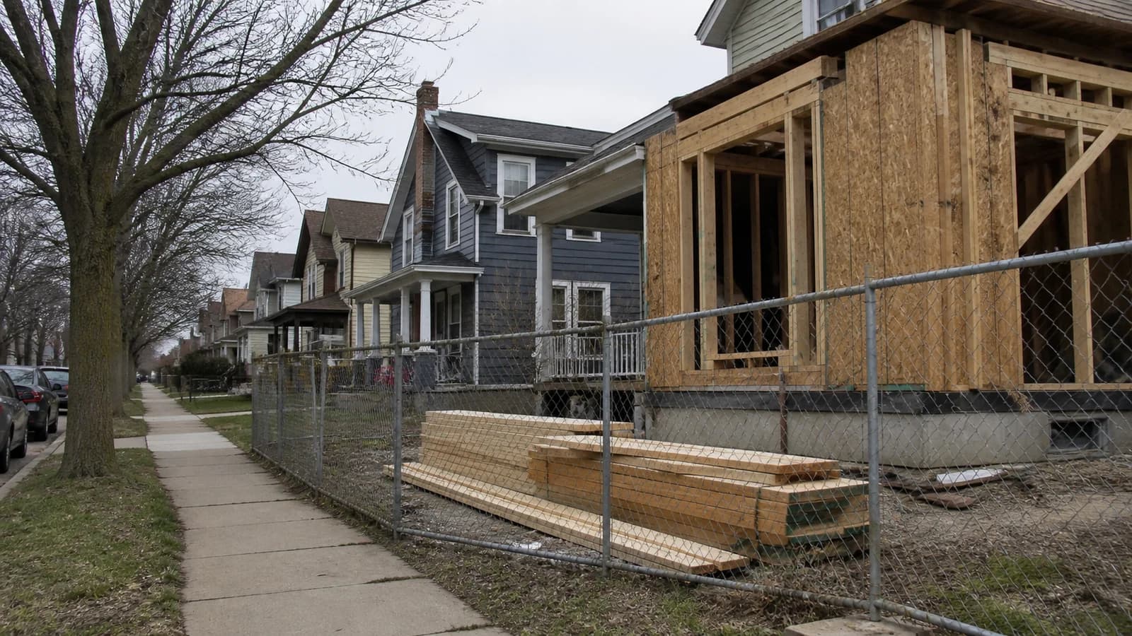 Editorial view of Columbus affordable apartments and City Hall public funding documents in Columbus, Ohio.