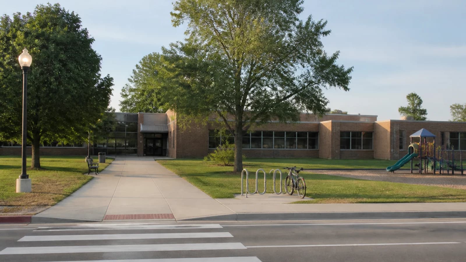 Illustrated operating Dublin elementary school beside a separate attendance-boundary map.