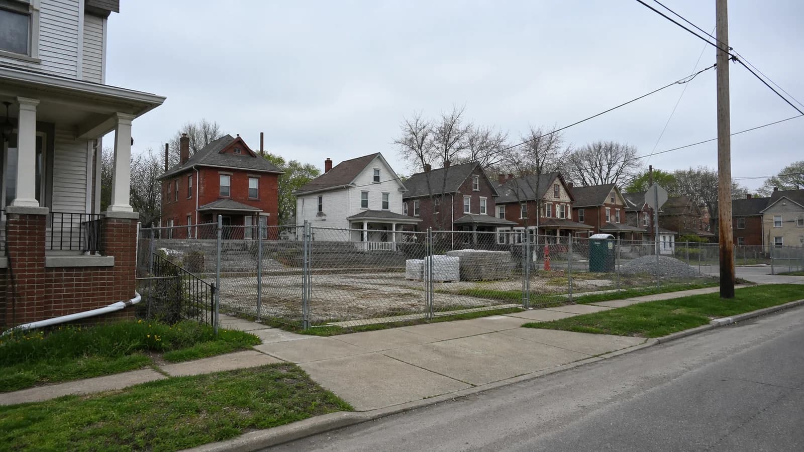 Editorial view of Mercy on Main proposed apartment site and distinct mid-rise affordable apartment building in Olde Towne East, Ohio.